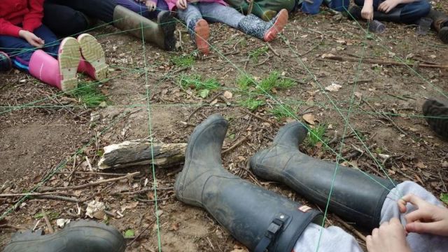 <strong><strong><strong></strong><br/>Sunshine on the tarpaulin.</strong><br/>Creativity and imagination using natural materials.</strong><br/>Working together to create a web during reflection time.